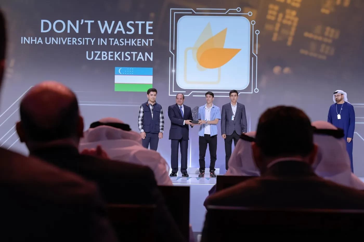 The Don't Waste team from INHA University in Tashkent, Uzbekistan receiving the Global Best M-Gov Award from Egyptian President Abdel Fattah El-Sisi