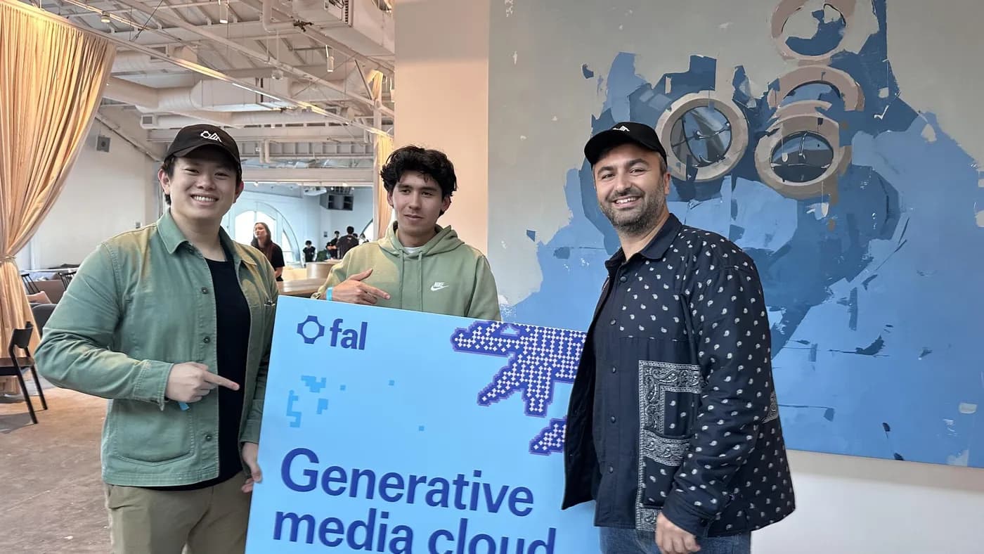 Oscar Hong and Javokhir Shomuratov with Burkay Gur, co-founder and CEO of fal.ai, at Hack FLUX: Beyond One