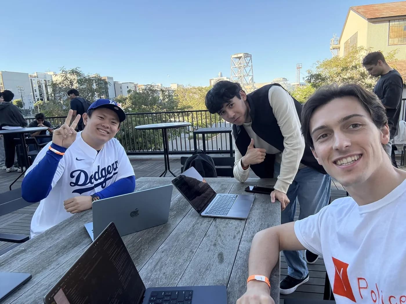 Oscar Hong, Javokhir Shomuratov and Alessandro Duico building startups.rip at AgentMail's HackHalloween