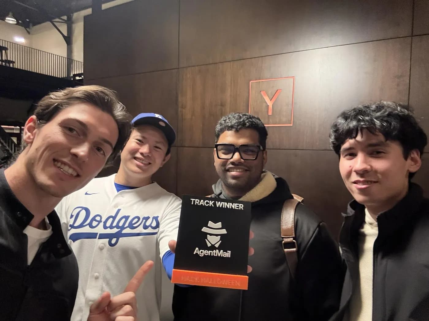 Alessandro Duico, Oscar Hong, Sai Krishna and Javokhir Shomuratov holding the AgentMail Summoners track winner trophy at Y Combinator